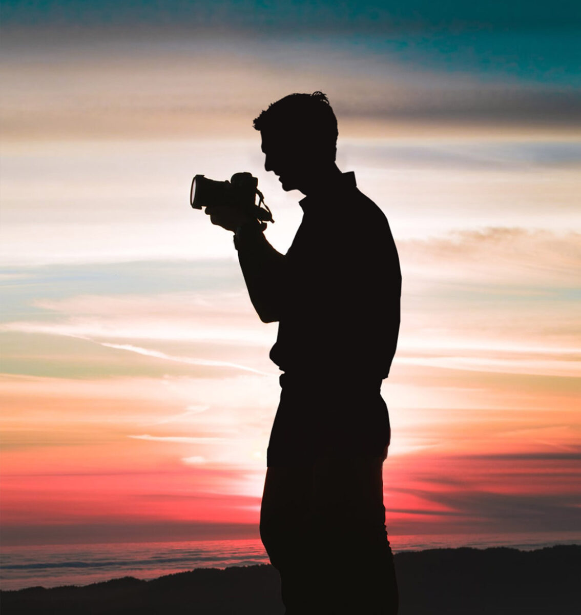 Digital mixed media artist Jaison Cianelli taking a photograph.